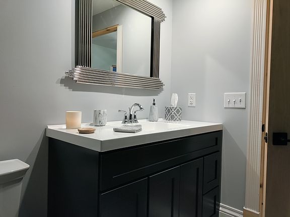 Main bath with 4ft vanity, Walk-in shower and lots of storage