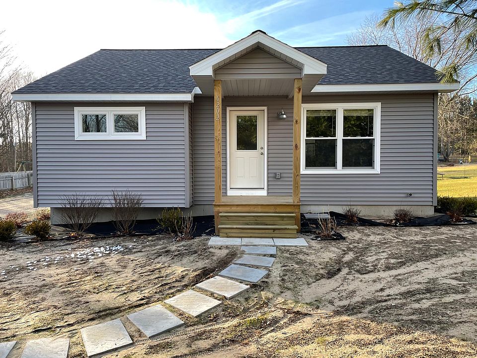 Front view. Landscaped though grass did not take. Scheduled for spring planting.