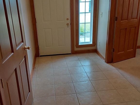 Entryway, coat closet, & 3rd room entrance