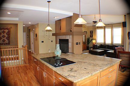 Kitchen with slab granite counter tops