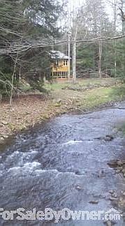 View from Arthur Devine Rd Bridge
						:
						Over 330' on Bear Creek