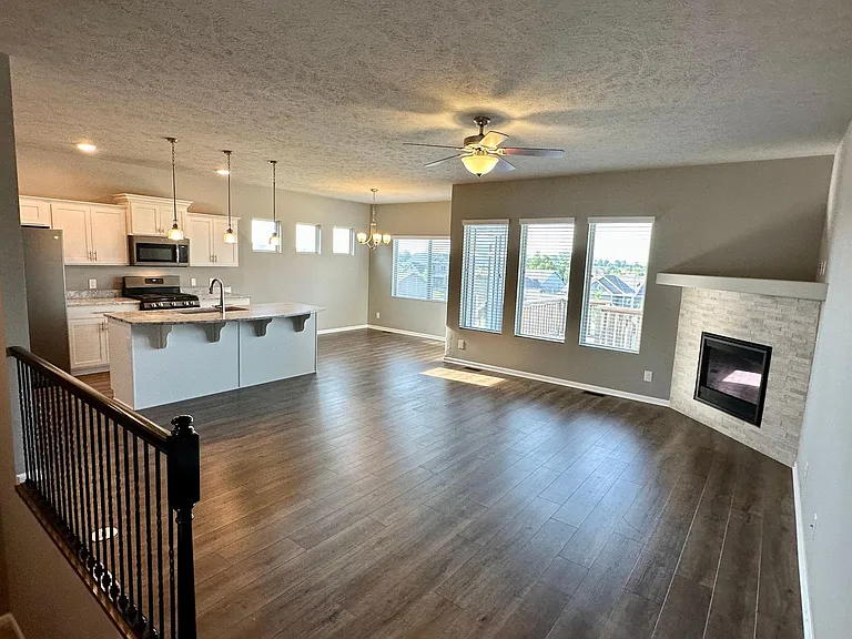 View from entryway into open concept living room