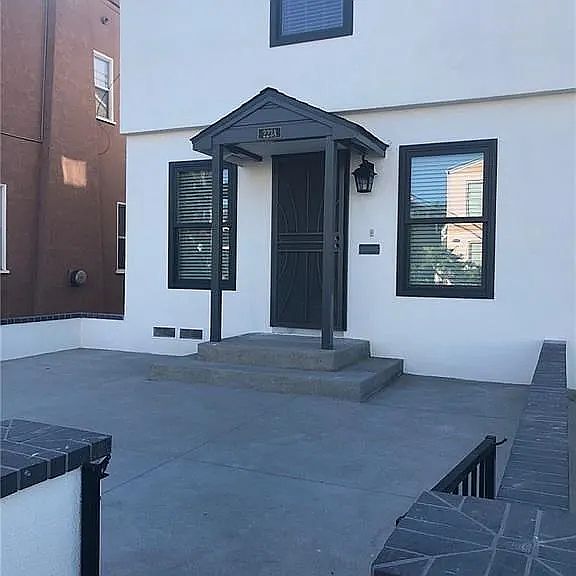Front entry with a private patio