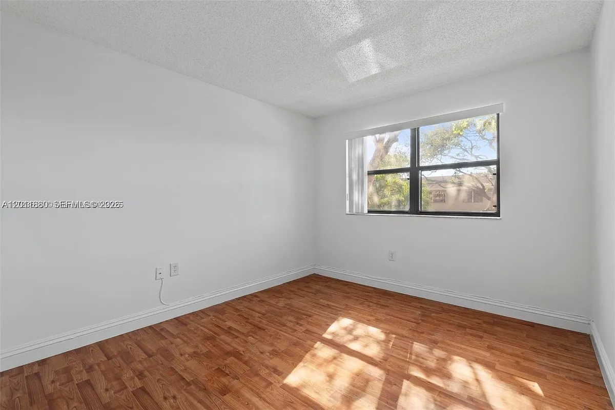 Building Photo - 15600 SW 80th St #L-203