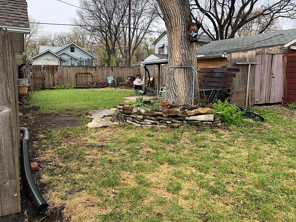 Backyard (nearly completely fenced in) *This house will not 