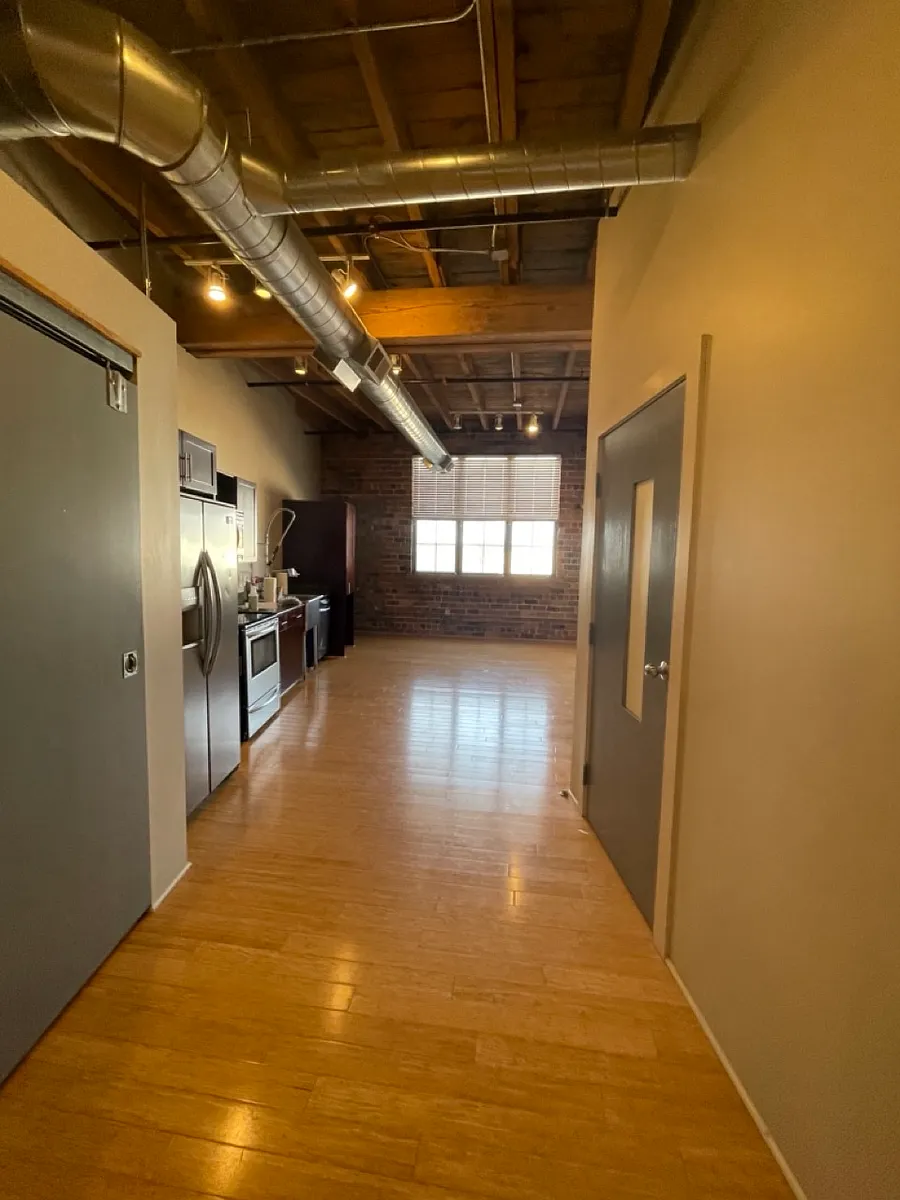 Photo of similar unit. Please note that colors, finishes, and fixtures may vary. - 317 S Elm St #309