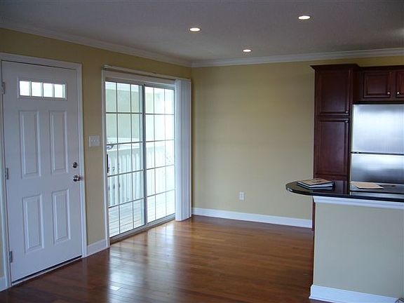 sliding glass door next to kitchen