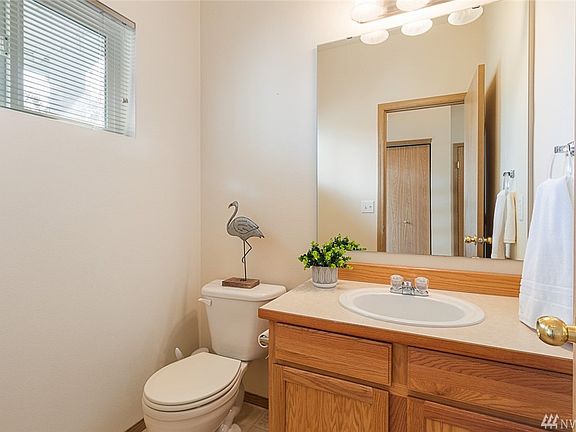 Half bath to the left off the front entrance.
