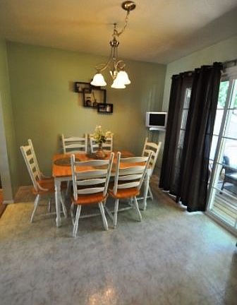Dining Area/new sliding glass door to deck, patio and grilling
