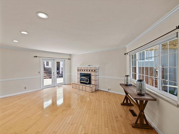 Downstairs Living room with gas fireplace