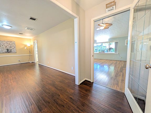 Step inside to the foyer, with the living and dining area on the left and the family room straight ahead.