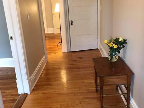 Neutral paint and hardwood floors throughout.