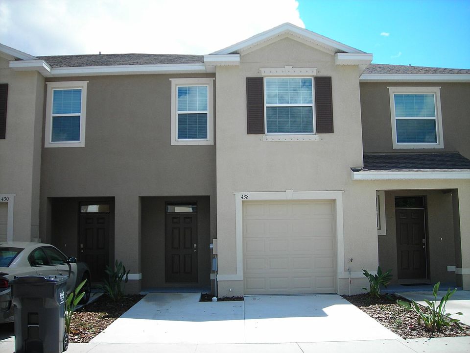 Frontal View showing 2 parking space and 1 car garage