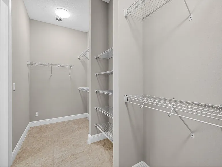 9318 SW Miracoli Way — Photo 32