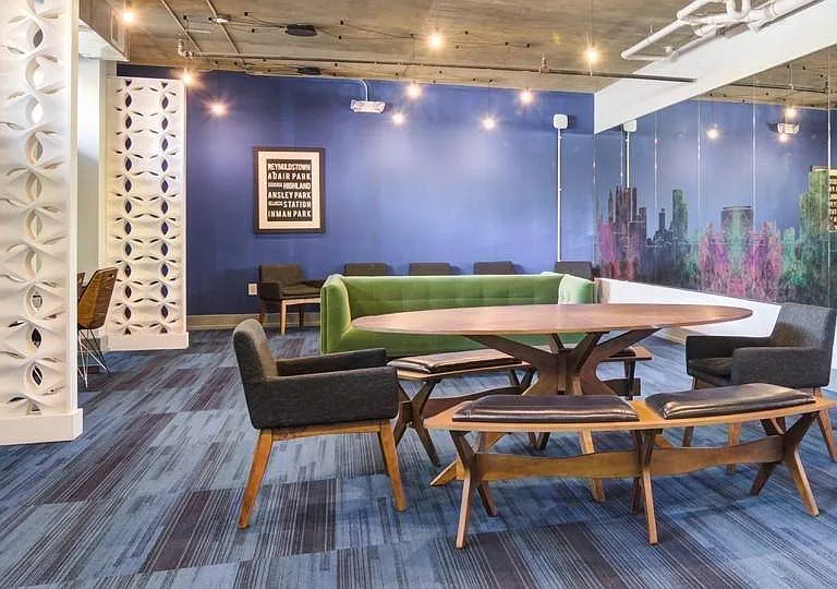 Study lounge with collaborative seating and vibrant wall art