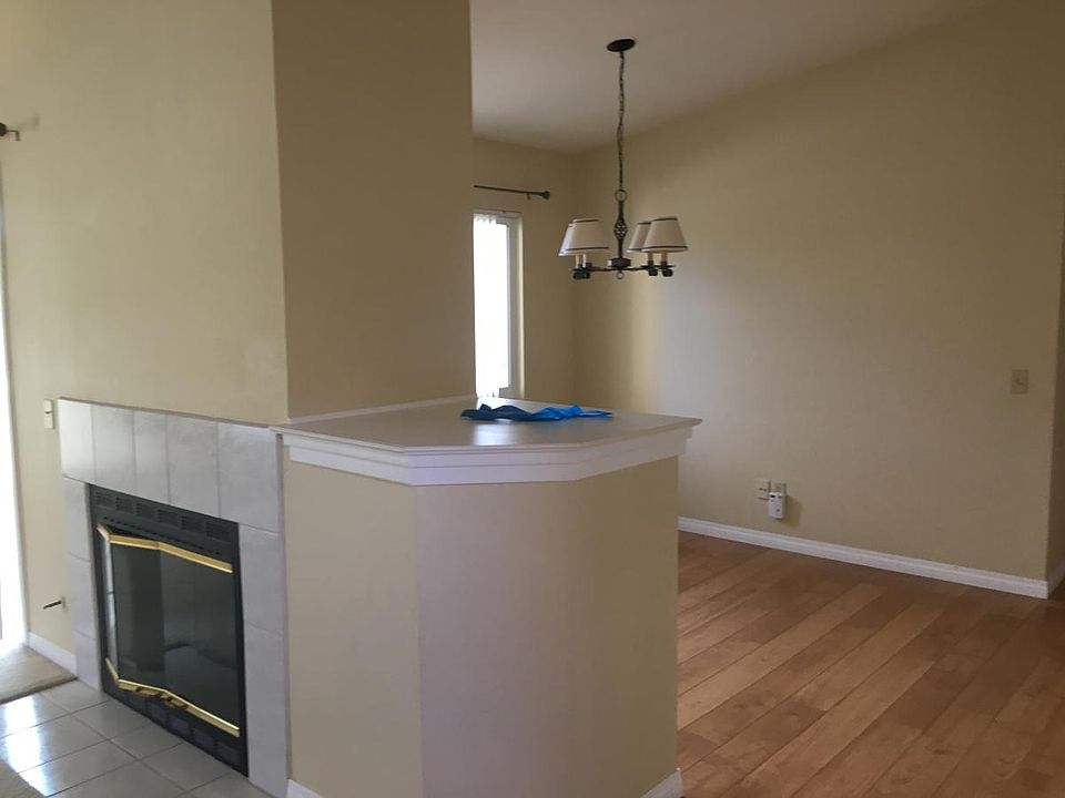 Large living room with cozy fireplace. Separate dining room 