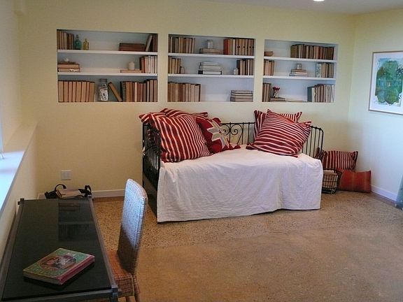 Downstairs family room with stained concrete floor