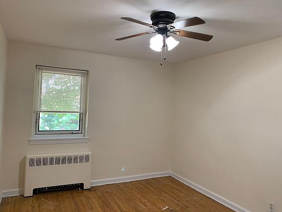 LARGE DINING ROOM WITH LIT CEILING FAN, JUST OFF KITCHEN. WOULD WORK WELL AS A DEN OR OFFICE