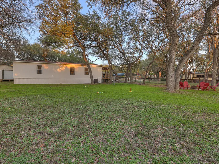 very spacious private backyard backs up to wooded area