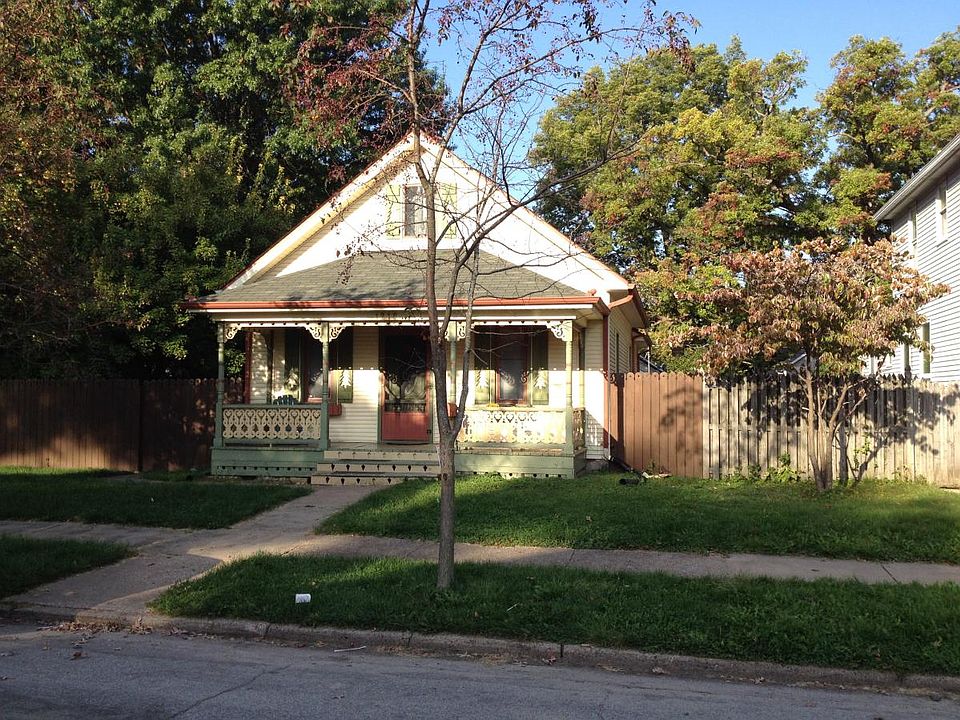 Front view in morning, looking W