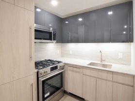 60 E 12th St