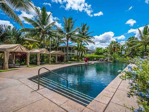 Infinity pool and cabanas