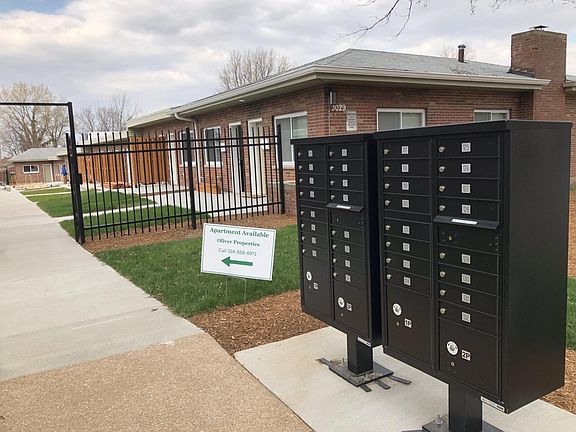 Mailboxes, and view from street looking towards units. Here