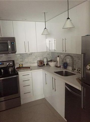 1st image of 3375 N Country Club Dr APT 204