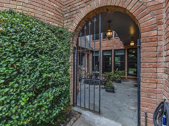 From the walkway you are greeted at the gated patio, you could sit in private waiting for the kiddos to off the bus.