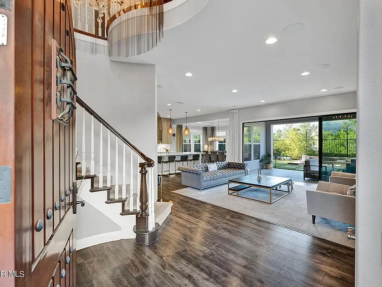 Entry into foyer and living