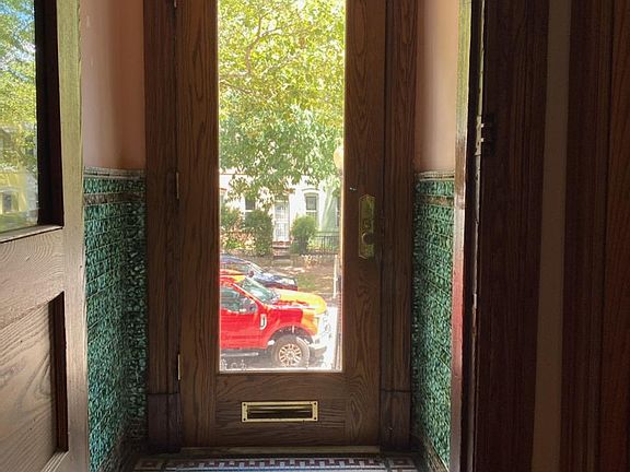 entry foyer with original tile