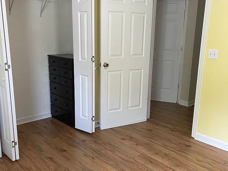 Yellow front room is 10.5 X 14 ft. Chest of drawers and Futon currently, but will supply a twin bed if you choose.