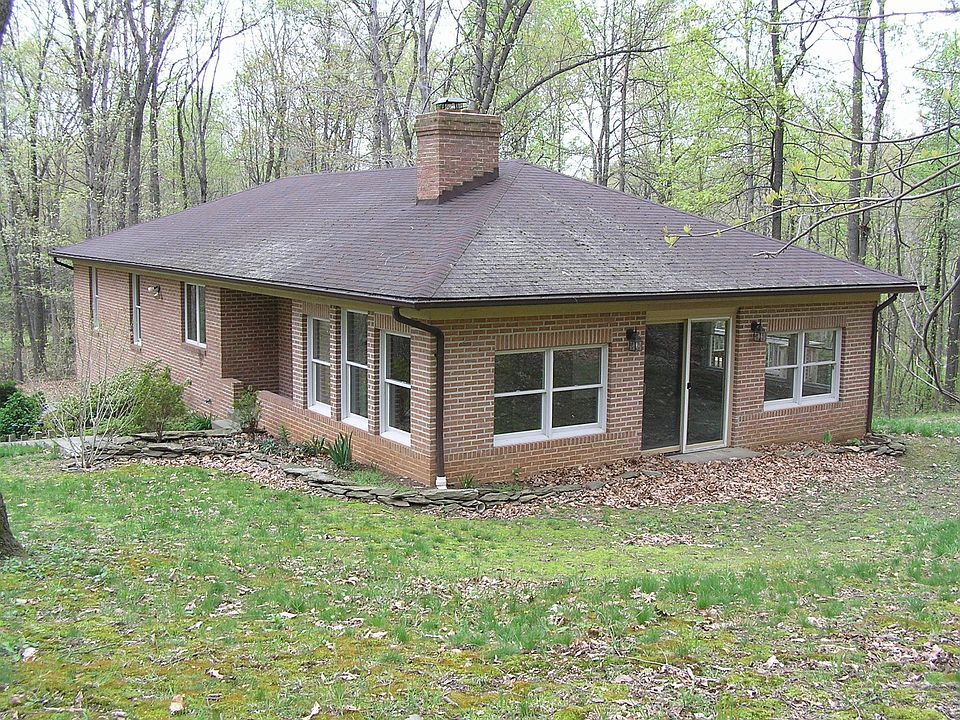 Side view of home showing sunroom