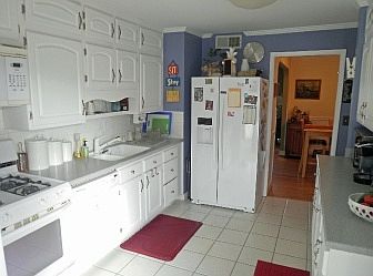 Updated kitchen w/Corian &Tile floor, & Dbbl. sink