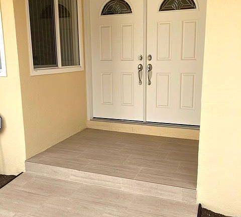 Front door with tile entrance