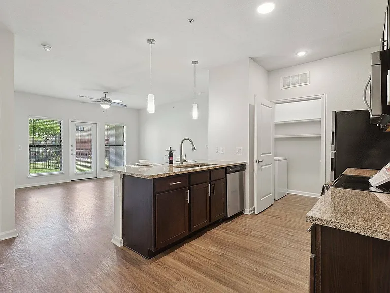 Enjoy seamless open-concept living with a bright kitchen and airy layout at Allora Bella Terra