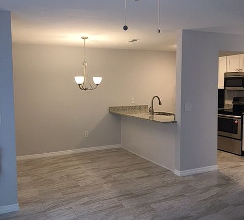 Dining area near kitchen/table and barstool area