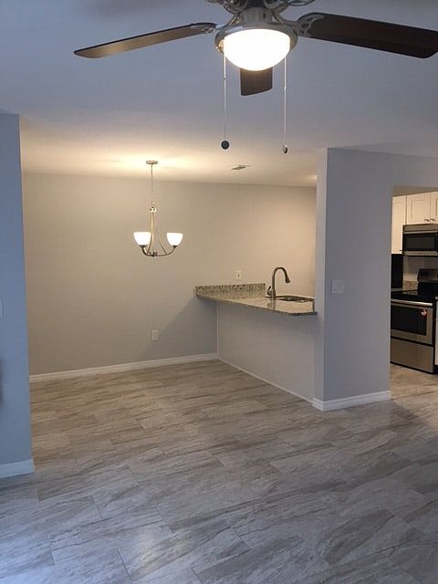 Dining area near kitchen/table and barstool area