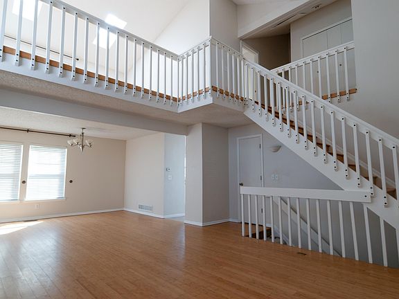 Living + 2nd Dining Space + view of loft & stairs