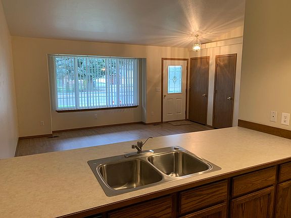 View from kitchen to living room, front door