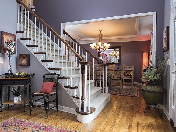 The spacious entry Hall leads to the office /den on the left and the dining room on the right.