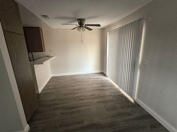 Dining area with ceiling fan