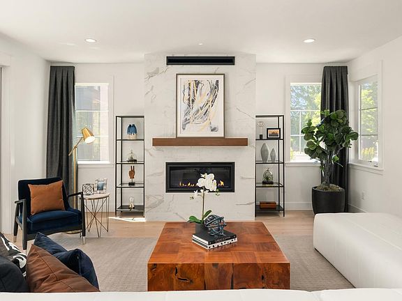 Gas fireplace with floor-to-ceiling tiled surround