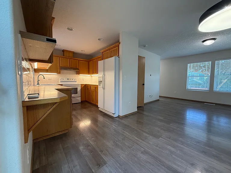 kitchen, kitchen nook, and living room