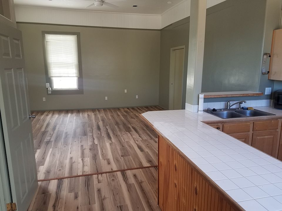 From top of stairs. Spacious unit with high ceilings.