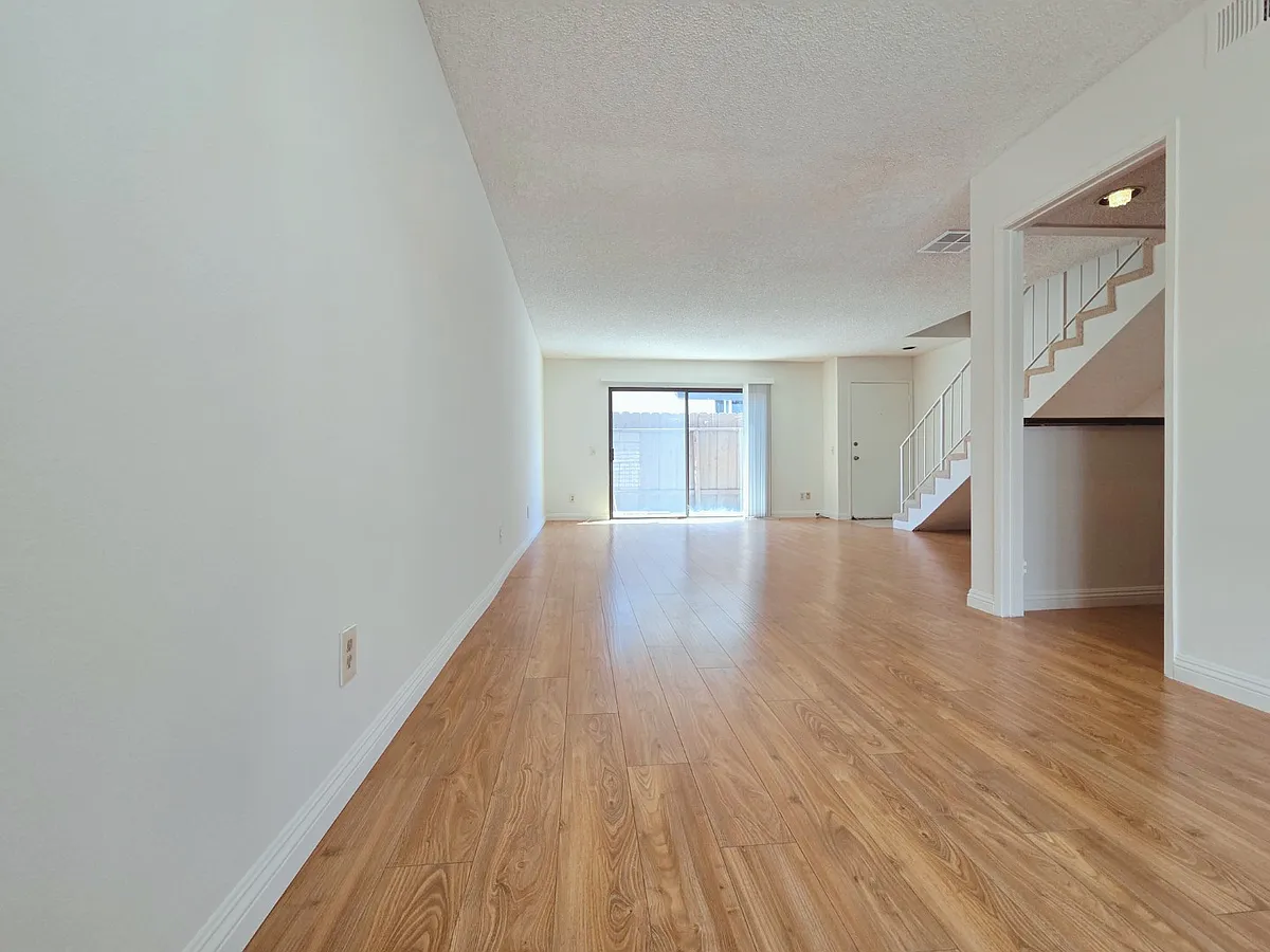 Living Room w/ Bar Area and Dining Area - 426 W Dryden St #102