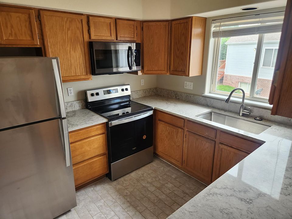 Kitchen with new appliances, countertop and sink