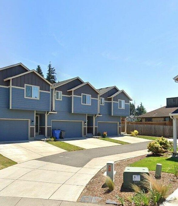 End unit, extra side yard and extra parking for this unit only