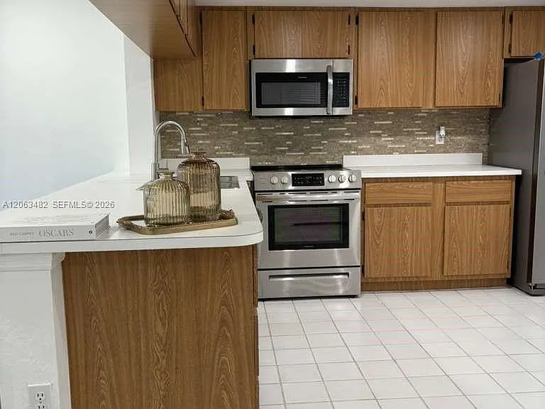 1005 Palm Beach Trace Dr #1005 — Photo 1