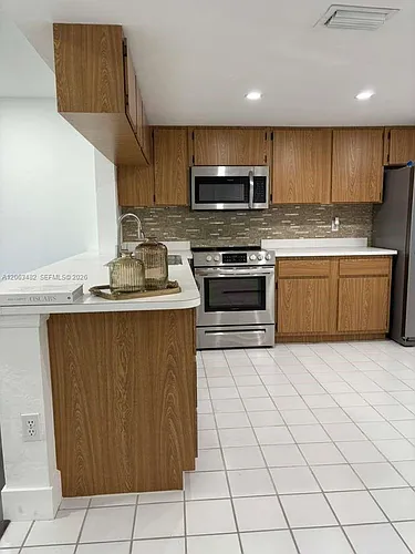 1005 Palm Beach Trace Dr #1005 Photo 1